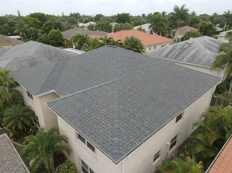 Aventura home roof before and after ridge vent installation for attic ventilation