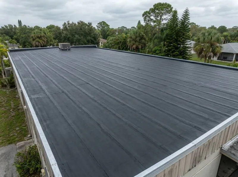 Hialeah commercial building before and after modified bitumen flat roof installation