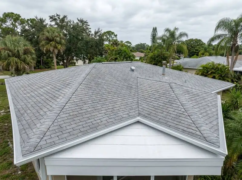 Hialeah home with damaged gutters before and after seamless gutter replacement