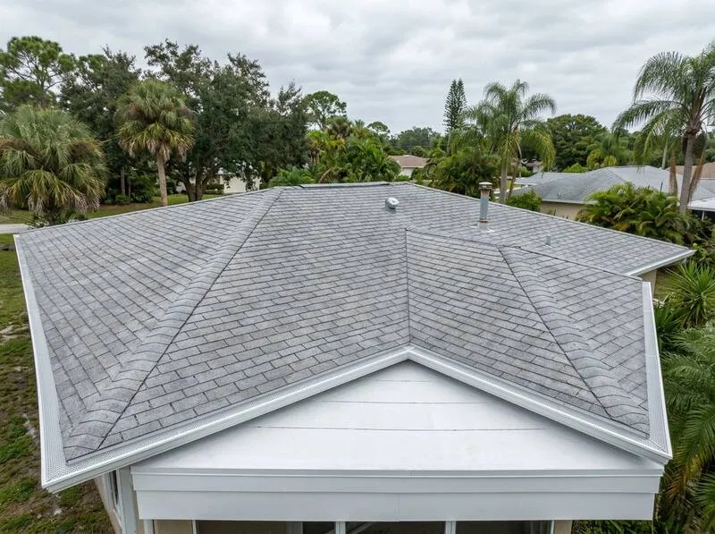 Hialeah home with damaged gutters before and after seamless gutter replacement