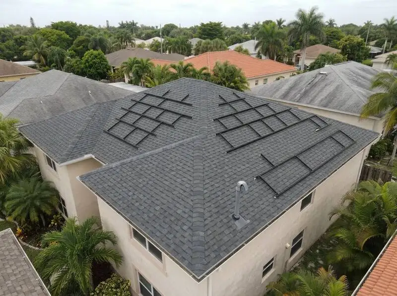 Miami home roof before and after shingle replacement with solar panel mounting prep
